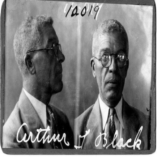 Police photograph of Arthur J. Black, front and profile, signed Arthur J. Black